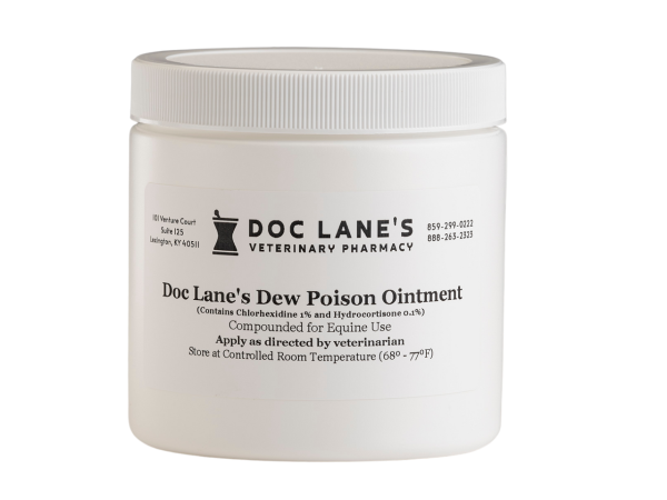 A bottle of Dew Poison Ointment for veterinary use.